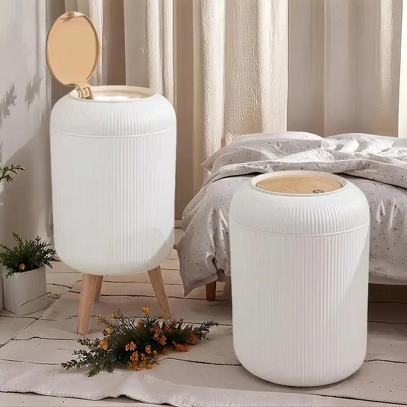 DropShopee Stylish floor-standing dustbin with modern ribbed design, wooden legs, and a flip-top lid. Perfect for kitchens, living rooms, and offices, offering functionality with elegant d?cor.(Set of 2) (SL007-DUSTBIN (Set of-2)